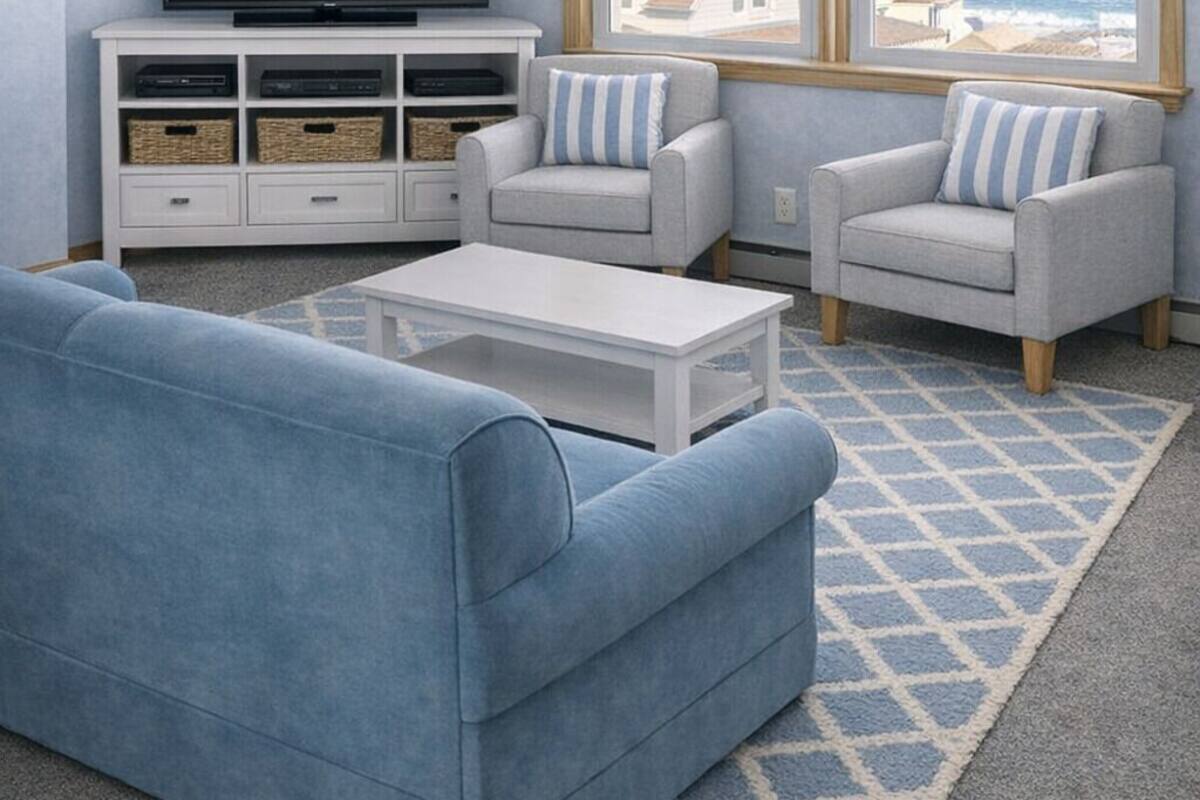 Suite studio Deluxe, vue partielle sur l'océan | Aire de séjour