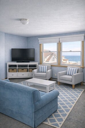 Suite Studio Deluxe, vue partielle sur l'océan | Coin séjour