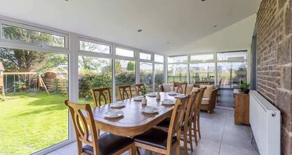 Spacious 5-Bed Home with Views, Garden & Playroom