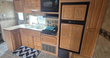 Spacious RV Rental Sleeps 8 — Full Kitchen, A/C, Fire Ring & Picnic Area