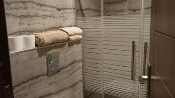 Hair dryer, towels, soap, toilet paper