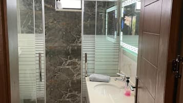 Hair dryer, towels, soap, toilet paper