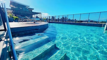 Outdoor pool, open 8:00 AM to 8:00 PM, sun loungers