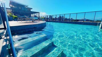 Outdoor pool, open 8:00 AM to 8:00 PM, sun loungers