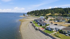 A coastal residential area with houses, a beach, and a lake. - The Harrington Hideaway (Coupeville)