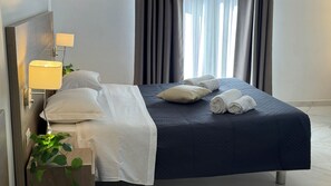 1 habitación, tabla de planchar con plancha, wifi y ropa de cama 