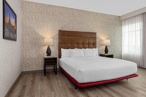 Suite, 1 King Bed with Sofa bed, Hearing Accessible, Bathtub (Upper Floor, Sofa Sleeper, 2 Rooms) | Premium bedding, desk, blackout curtains, iron/ironing board - Drury Plaza Hotel Mobile (Mobile)