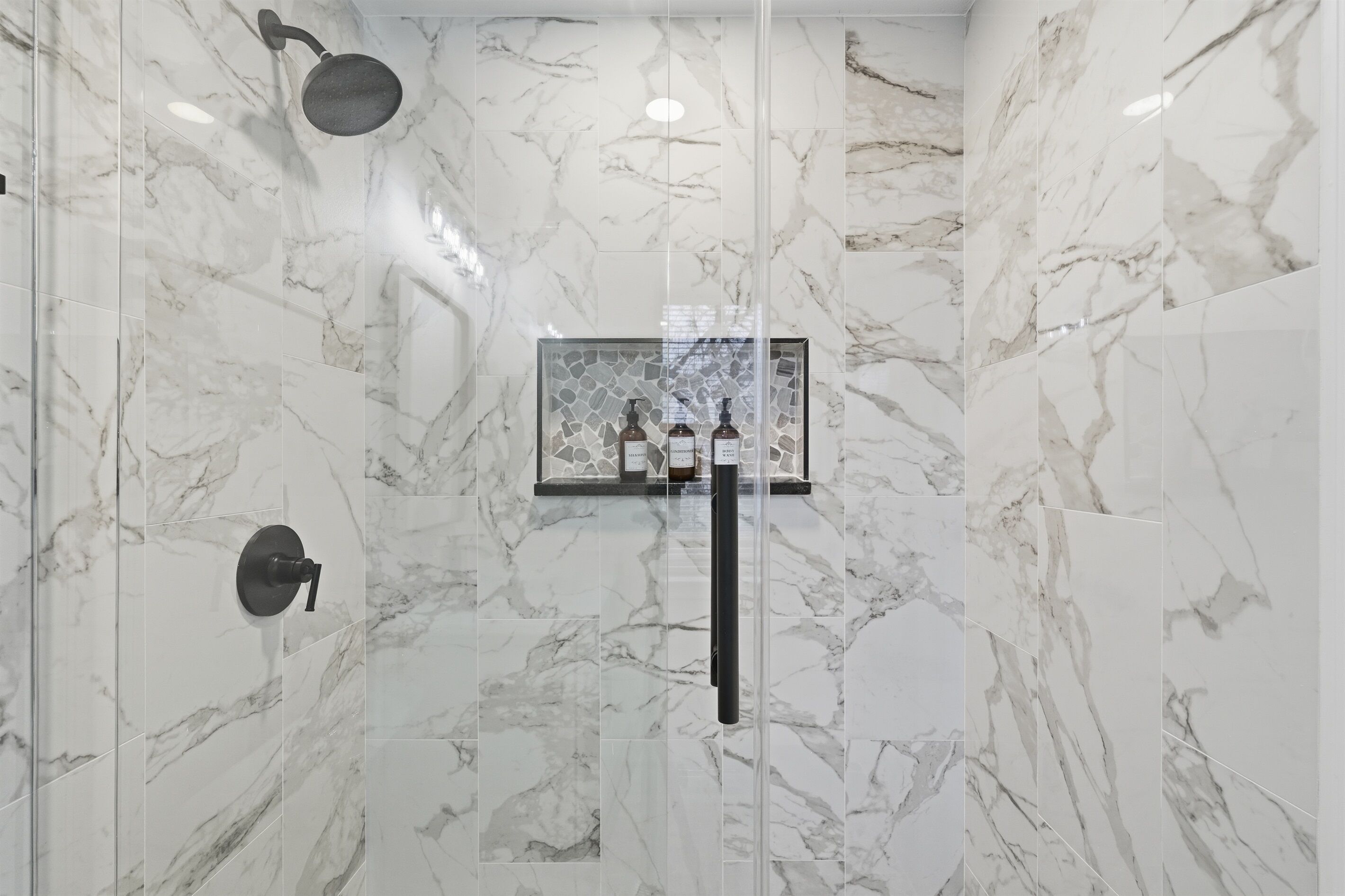 Shower, eco-friendly toiletries, hair dryer, towels