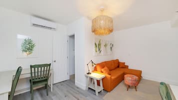 Family Suite, Multiple Beds, Private Bathroom (Self check-in) | Living area | 42-inch Smart TV with digital channels