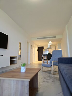 Exclusive Apartment | Living area | 55-inch LED TV with digital channels, Netflix, streaming services - Exclusive 2BR Apartment Punta Cana (Punta Cana)