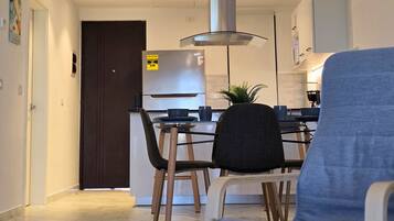 Exclusive Apartment, Pool View | Dining