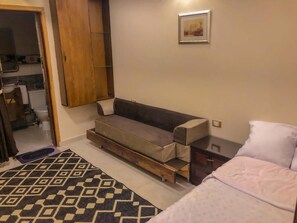 Chambre simple Confort, balcon, vue sur le jardin | Intérieur