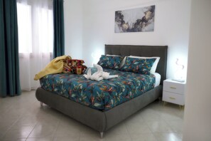 Una cassaforte in camera, ferro/asse da stiro, culla da viaggio