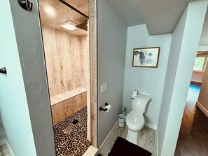 Shower, towels, soap, toilet paper