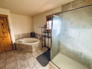 Shower, towels, soap, toilet paper