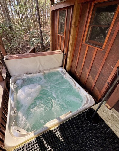 Luxury Mountain Hideaway. Extensive outdoor living, large hot tub, and fire pit.