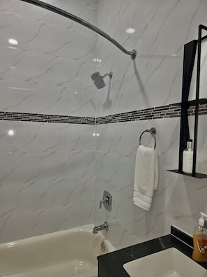 Hair dryer, towels, soap, shampoo
