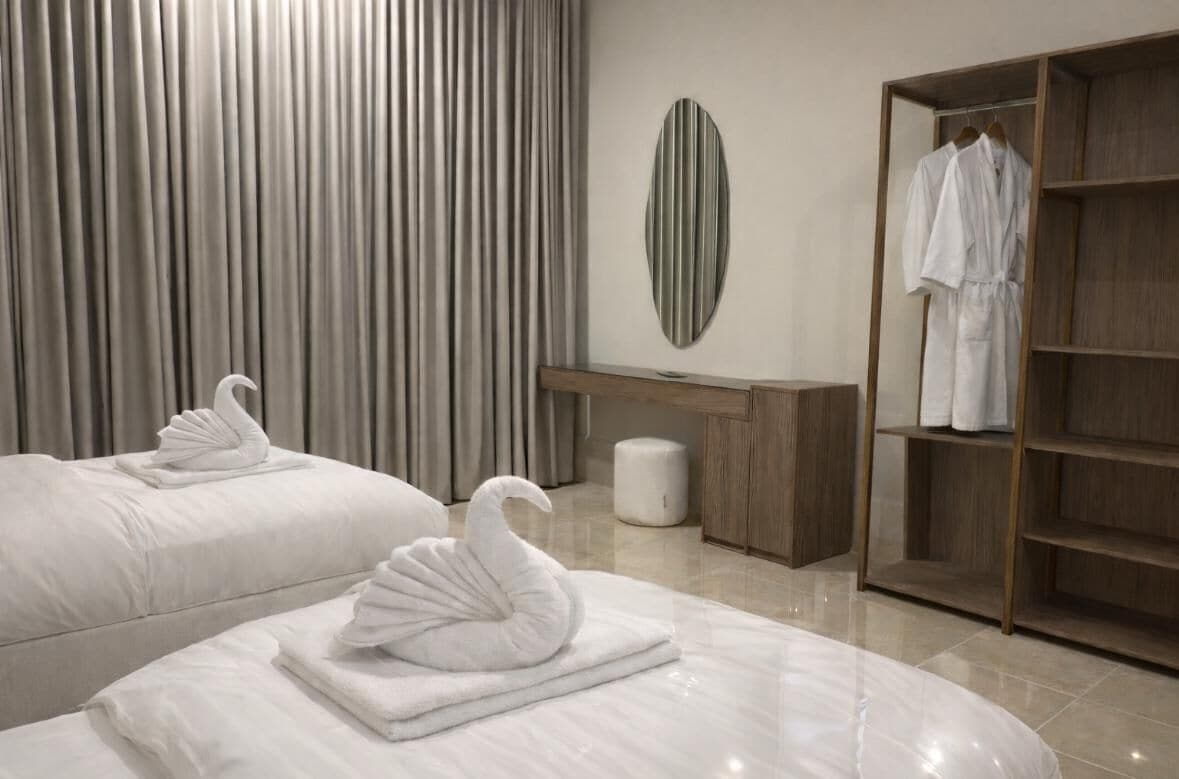 Premium bedding, memory foam beds, in-room safe, laptop workspace