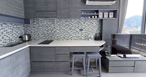 Deluxe Apartment, 1 Bedroom (CityGate Kamala 1BR Altitude Suite) | Private kitchen | Full-sized fridge, microwave, stovetop, cookware/dishes/utensils - Citygate Kamala 1Br Altitude Suite (Kamala)