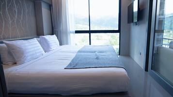 Apartment, 1 Bedroom (Serenity in CityGate Kamala Resort) | In-room safe, iron/ironing board, free WiFi