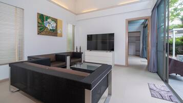 Exclusive Villa, 4 Bedrooms (Mahogany 4BR Pool Villa in BangTao) | Living room | Flat-screen TV