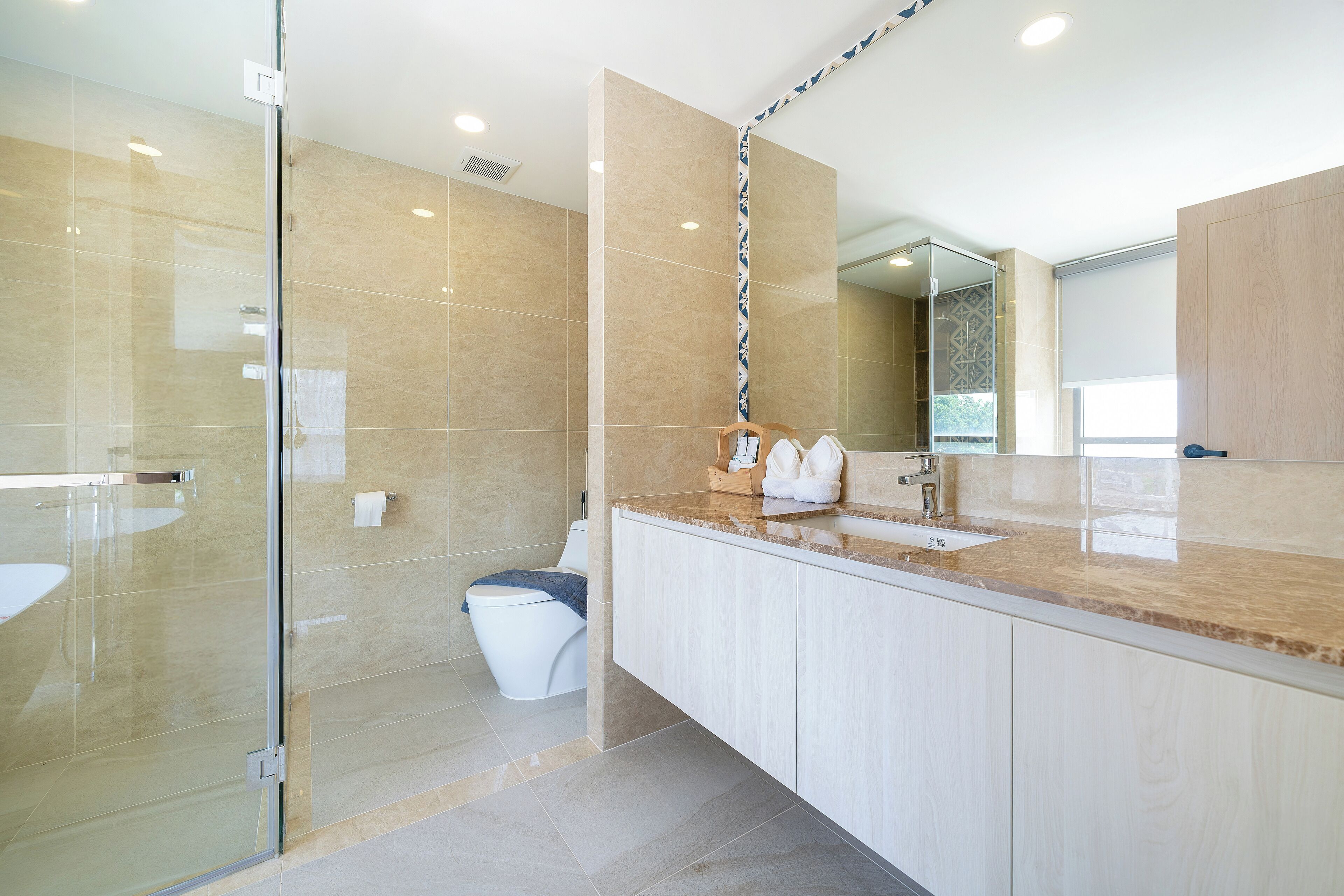 Apartment, 2 Bedrooms (Ozone Condo in Splendid Laguna Area) | Bathroom | Shower, rainfall showerhead, hair dryer, slippers