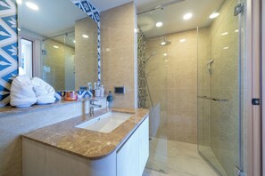Apartment, 1 Bedroom (Ozone Condo in Excellent Laguna Area) | Bathroom | Shower, rainfall showerhead, hair dryer, bidet