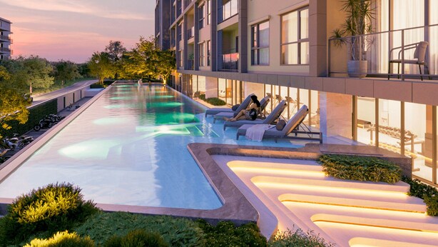 A modern hotel with a swimming pool, sun loungers, and a well-maintained garden. - Space Cherngtalay In Elegant Bangtao (Choeng Thale)