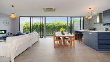 Villa, 3 Bedrooms (Granary Designer Loft Pool in Pasak) | Living area | 65-inch LED TV with digital channels