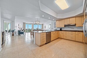 Fridge, microwave, oven, stovetop - Caribe Resort B314 | Lazy River, Pools, Hot Tubs, Gym, Tennis | Waterfront Condo | Beach Getaways (Orange Beach)