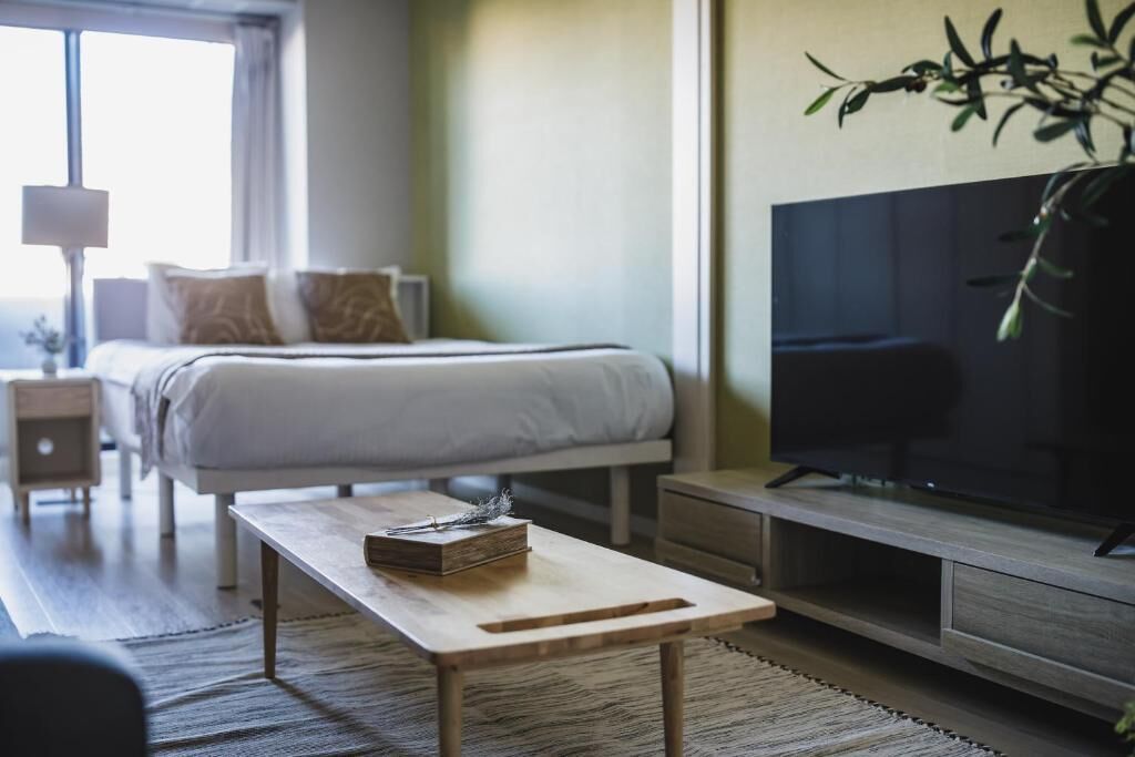 Premium Apartment, Balcony, City View | Blackout curtains, iron/ironing board, free WiFi