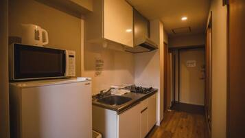 Premium Apartment, Balcony, City View | Private kitchen | Cleaning supplies, paper towels