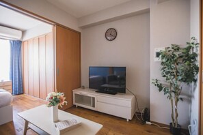 Premium Apartment, Balcony, City View | Living area | TV - R Residences Namba South 1 (Osaka)