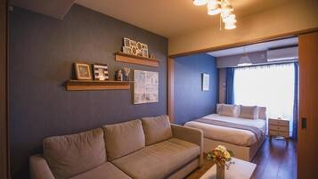 Premium Apartment, Balcony, City View | Living area | TV