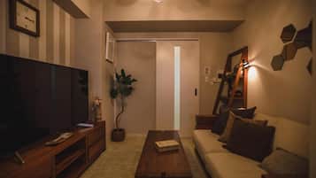 Premium Apartment, Balcony, City View | Living area | TV