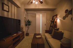 Premium Apartment, Balcony, City View | Living area | TV - R Residences Namba South 1 (Osaka)