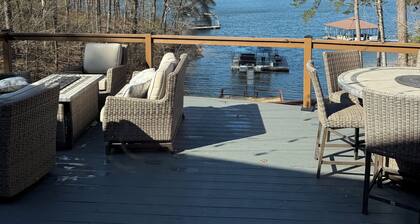 Enjoy beautiful sunsets at Blue Bird Cove on Lewis Smith Lake with private dock.