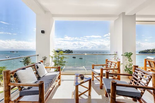 Modern 2BR Oceanview Retreat w/ Balcony  Walk to Bay