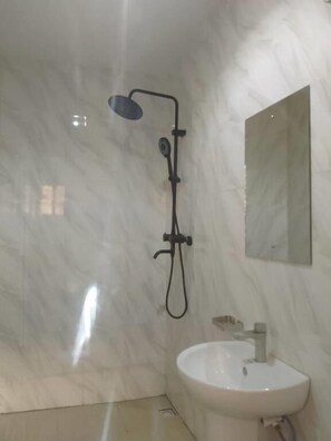 Apartment, Balcony, Garden View | Bathroom | Shower, towels, toilet paper - Aquarian 2 Bedrooms Apartment (Lagos)