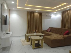 Apartment, Balcony, Garden View | Living area - Aquarian 2 Bedrooms Apartment (Lagos)