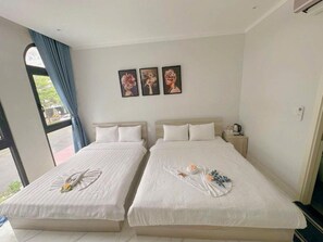 Kamar Quadruple | Wi-Fi gratis dan seprai linen