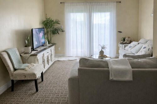 Bright 2-bedroom apartment with AC in peaceful community with pool tennis court