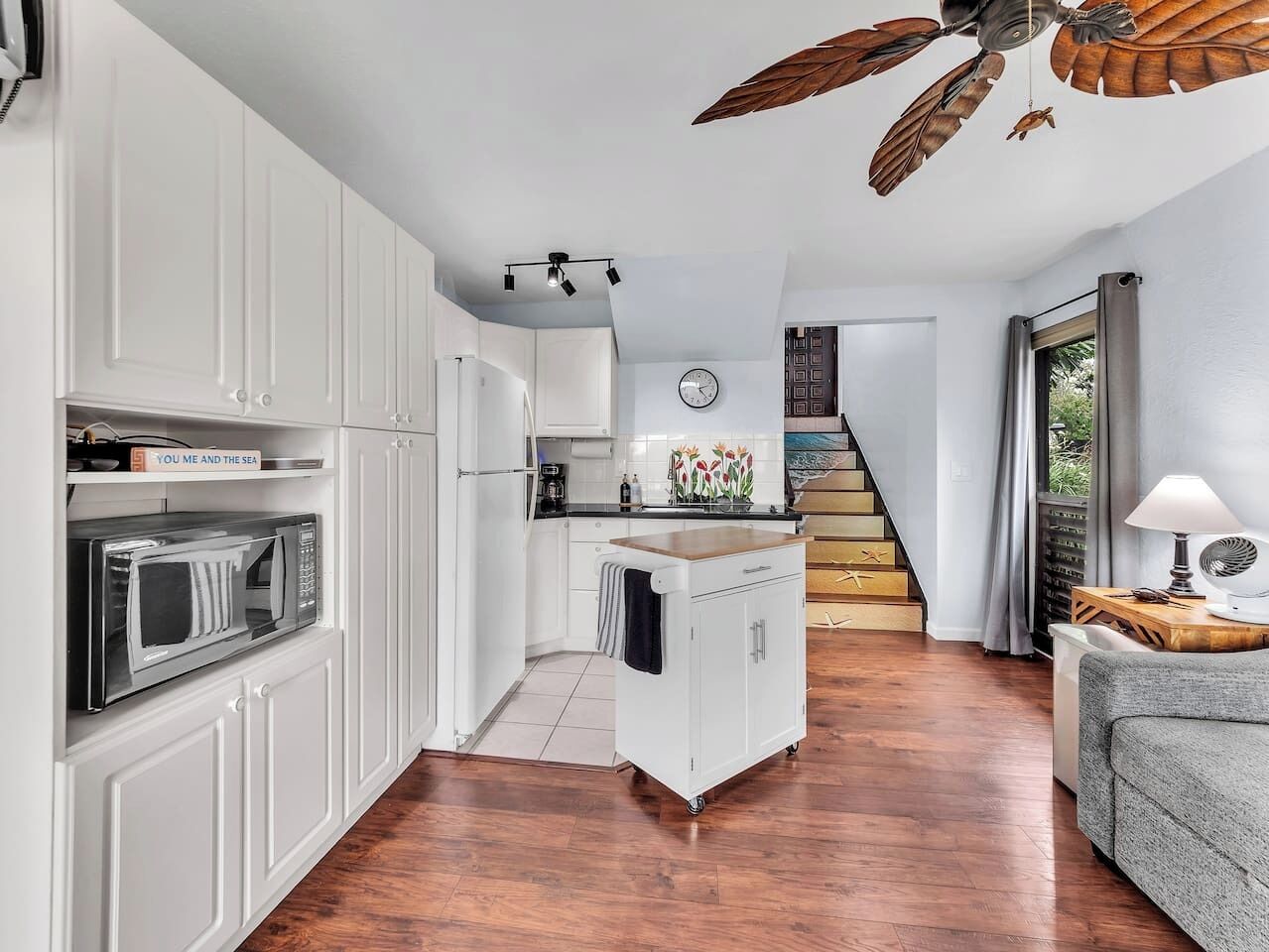 Fridge, microwave, coffee/tea maker, cookware/dishes/utensils