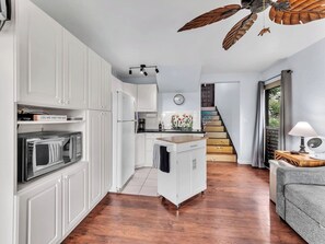 Fridge, microwave, coffee/tea maker, cookware/dishes/utensils