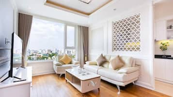 Luxury Apartment, 2 Bedrooms, Kitchen, City View | Living area | 55-inch Smart TV with digital channels
