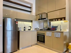 Appart'hôtel, balcon, vue ville | Cuisine privée