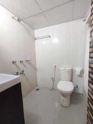 Family Room | Bathroom | Shower, free toiletries, towels, soap - Hotel Sweet Place (Dhaka)