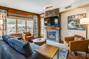 TV, fireplace - Stunning 2BR with Pool, Hot Tub & Gym (Canmore)