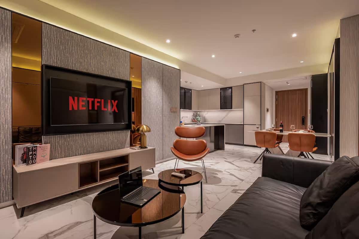 Luxury Apartment, 2 Bedrooms, Balcony, City View | Living area | 55-inch Smart TV with digital channels