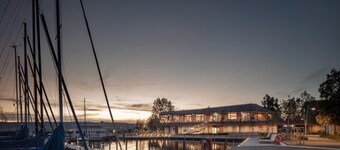 Spacious guesthouse with terrace and lake view